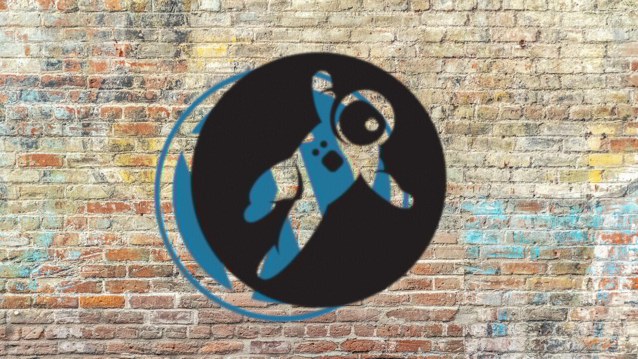 Grav logo covering WordPress logo on brick wall