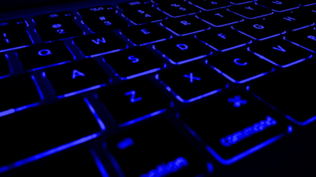 Black keyword with blue LED lettering and backlighting