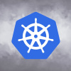 Kubernetes logo over blurry smoky background