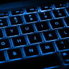 Black keyboard with blue LED lettering and backlighting