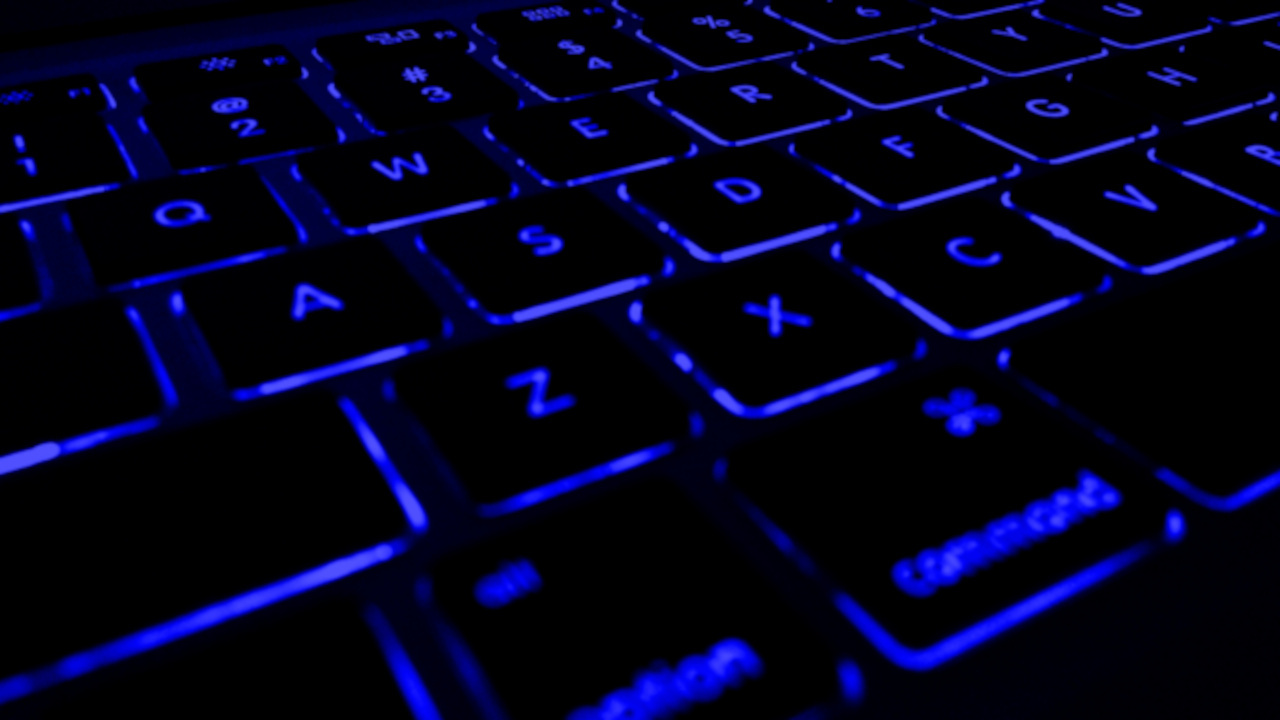 Black keyword with blue LED lettering and backlighting