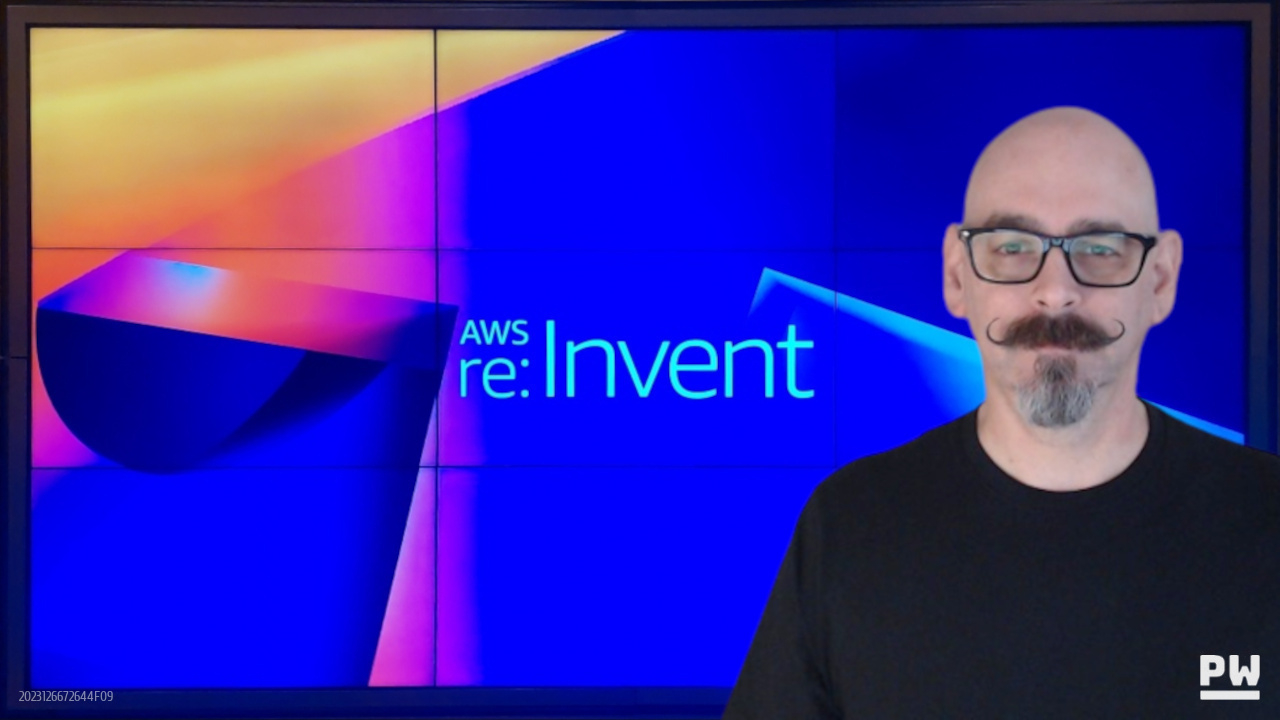 Peter Woods in front of AWS re:Invent video wall