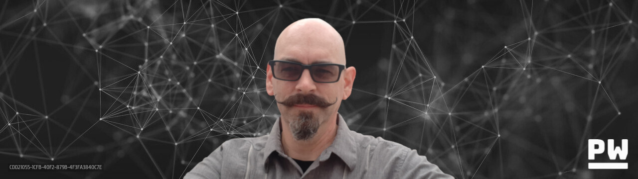 Peter Woods in front of abstract network backgroundl