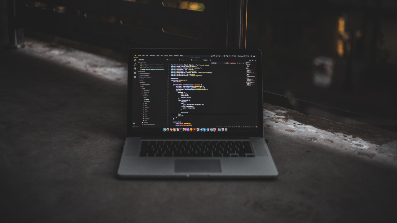Open laptop running code editor
